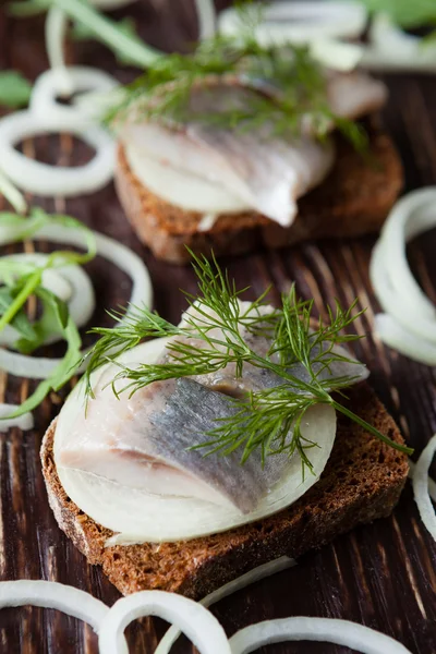 Herring fillets in grain bread — Stock Photo, Image