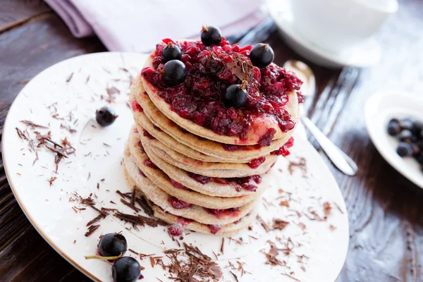 Crispy pancakes with berries on top — Stock Photo, Image