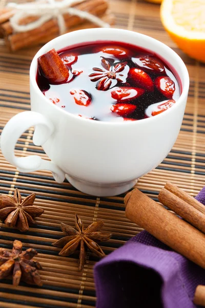 Mulled wine with almonds in a white cup — Stock Photo, Image