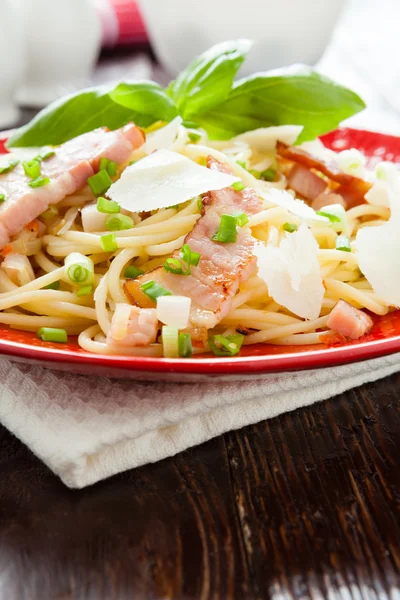 Spaghetti with ham and cheese — Stock Photo, Image