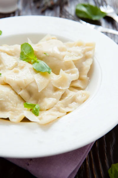 Square of the Meat ravioli with basil leaves — Stock Photo, Image