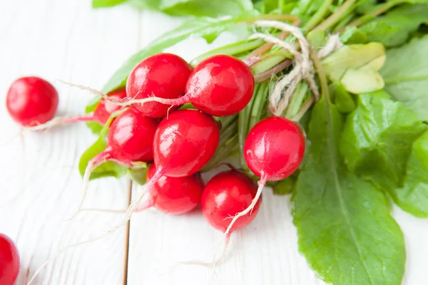 Bunch fresh radish with leaves on the boards — Stock Photo, Image