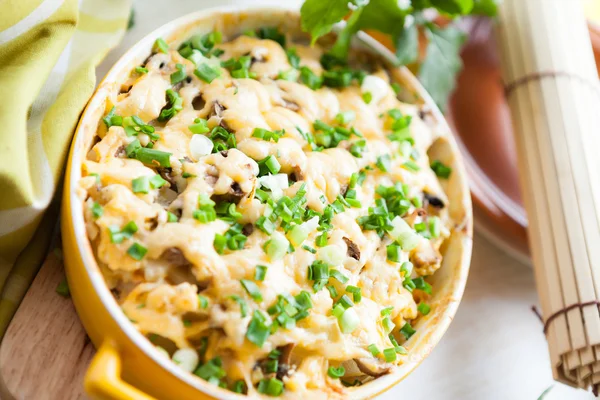 Mushroom casserole with cheese and chives — Stock Photo, Image