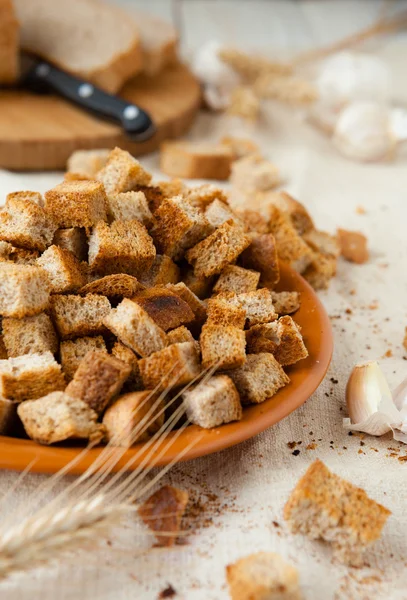 Croutons, pile of bread crumbs on a plate — Stock Image Croutons, pile of bread crumbs on a plate Royalty Free Stock Images