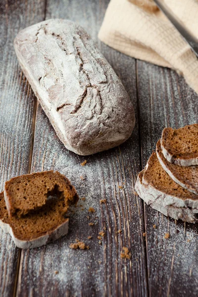 Rye bread on a wooden table, top view — Stock Photo, Image