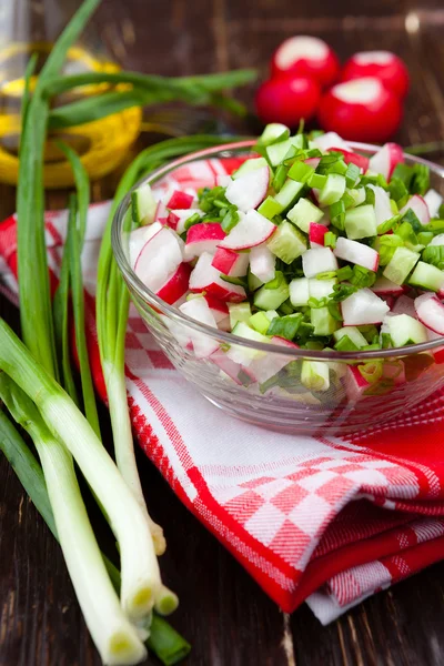 Fresh vegetable salad in a transparent bowl — Stock Photo, Image