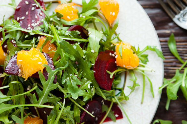 fresh green salad with arugula and beets