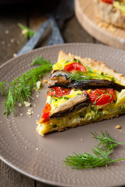 Slice of quiche with vegetables and fish, sprats — Stock Photo, Image