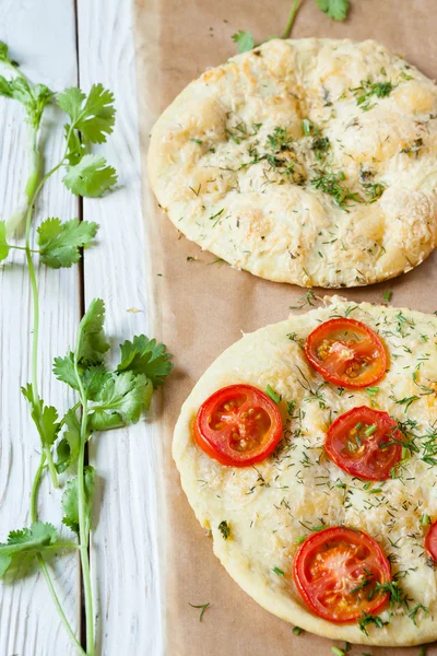 Focaccia with tomatoes and herbs — Stock Photo, Image