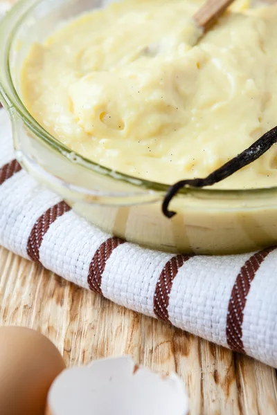 Custard cream in a transparent saucepan — Stock Photo, Image