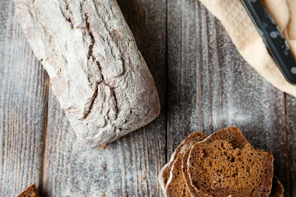 Loaf of bread with cracks, top view — Stock Photo, Image