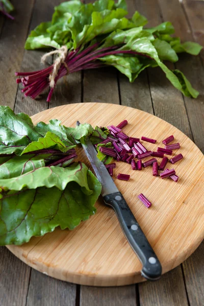 Chard leaves on a cutting board — Stock Photo, Image