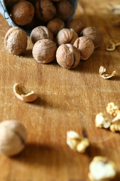 Fresh nuts on wooden table — Stock Photo, Image