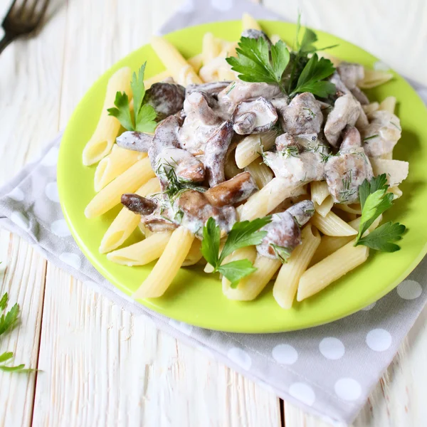 Penne pasta with mushrooms and sauce — Stock Photo, Image