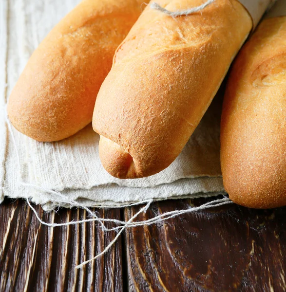 Three baguette on hemp cloth — Stock Photo, Image