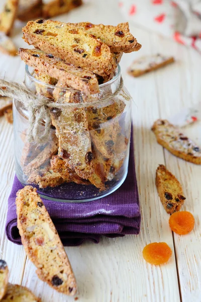 Homemade biscotti in a clear glass jar — Stock Photo, Image