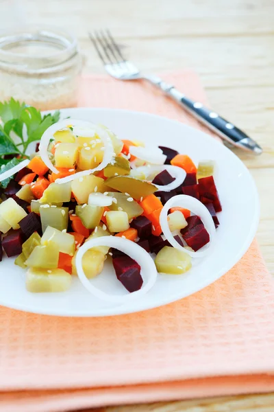 Salad with beetroot on a white plate — Stock Photo, Image