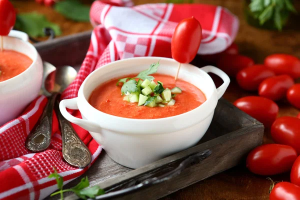 Tomato cream soup in a white tureen — Stock Photo, Image