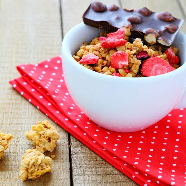 Granola with dried strawberries and chocolate — Stock Photo, Image