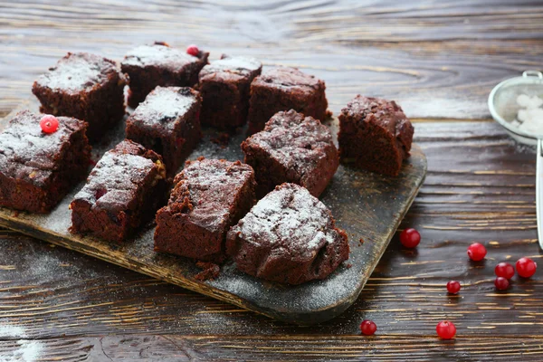 Cranberry brownie pieces on the board — Stock Photo, Image