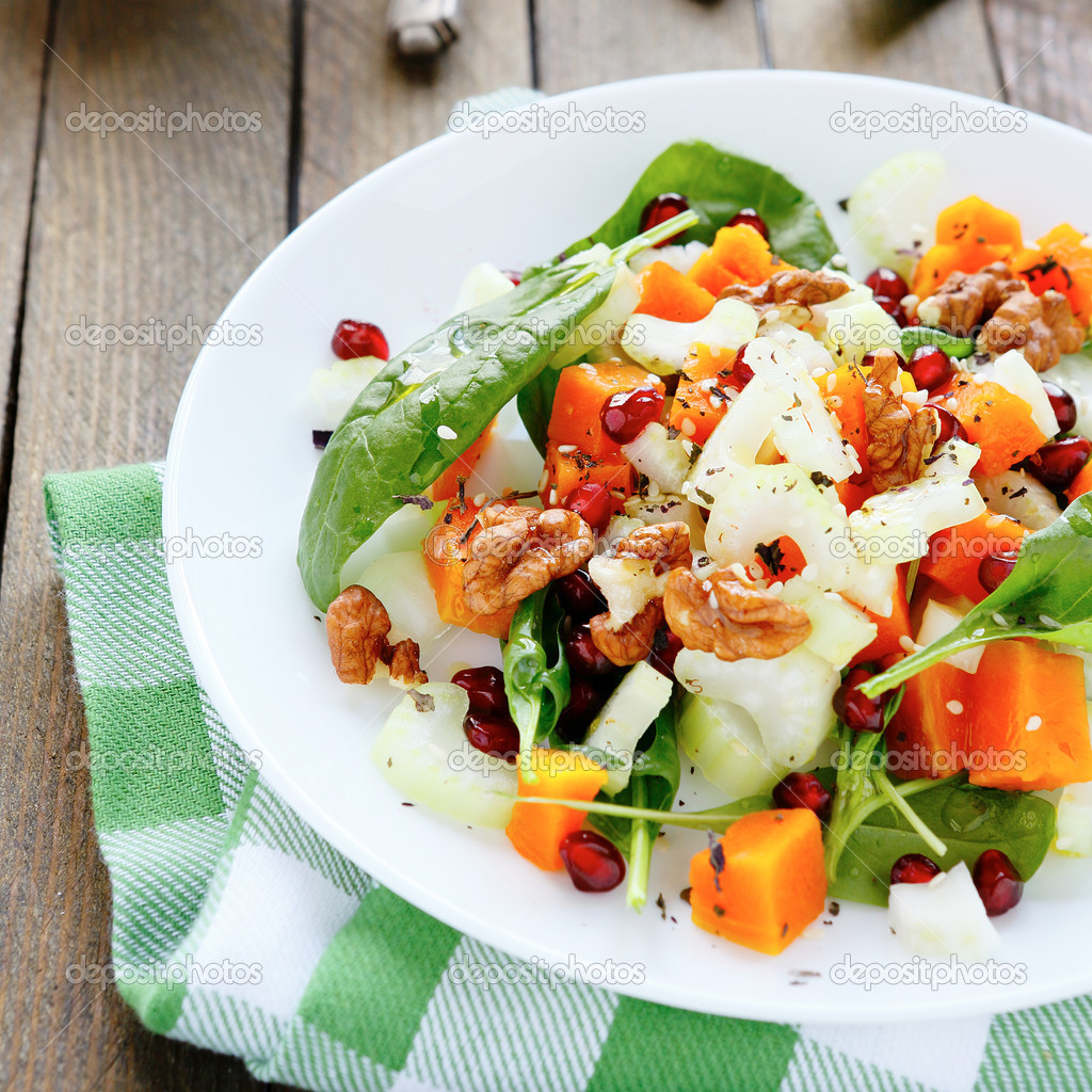 salad with slices of baked pumpkin