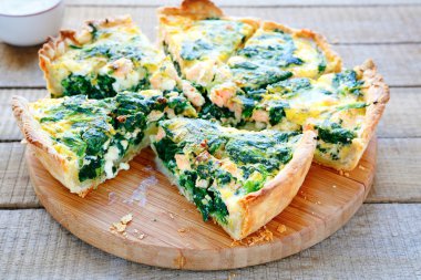 Round PIE with spinach and fish clipart