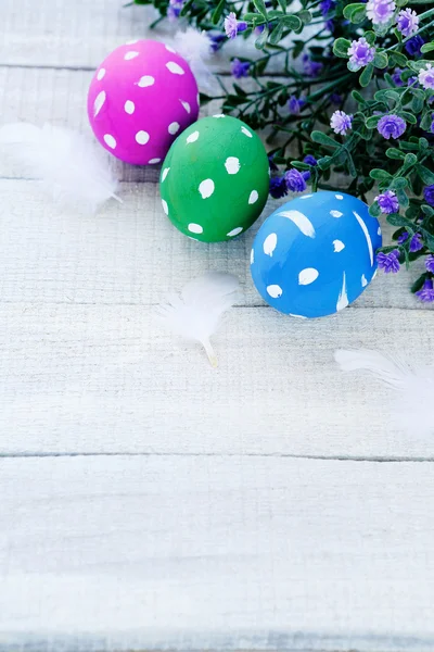 Easter eggs on white boards — Stock Photo, Image