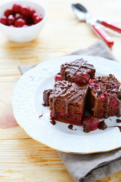 Brownie cake with cherries — Stock Photo, Image