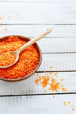 uncooked red lentils in a bowl