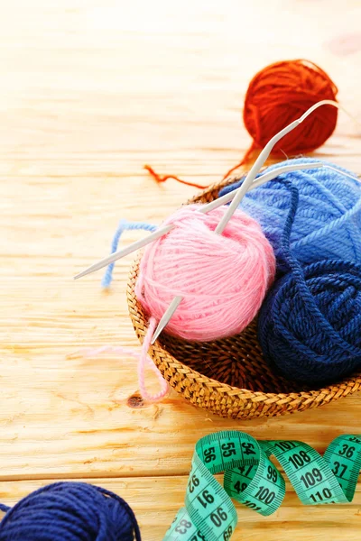 Balls of yarn and knitting needles — Stock Photo, Image