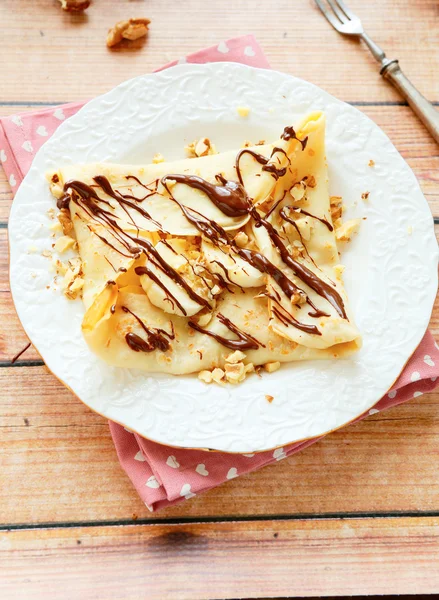 Pancake with banana and chocolate sauce — Stock Photo, Image
