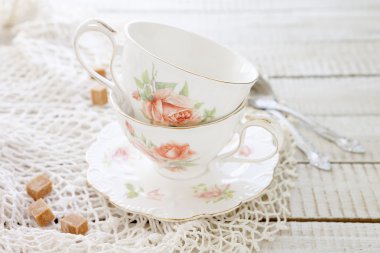 two vintage porcelain cups clipart