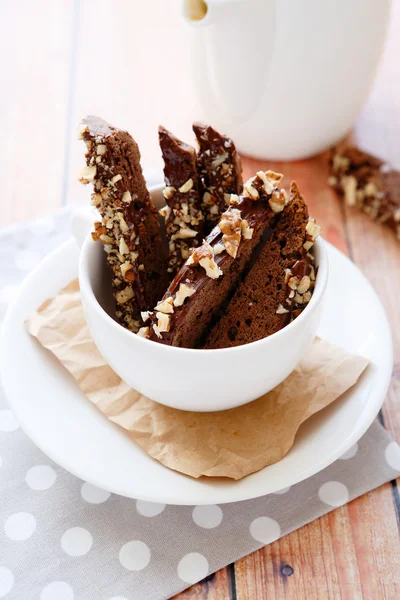 Chocolate biscotti in white cup — Stock Photo, Image