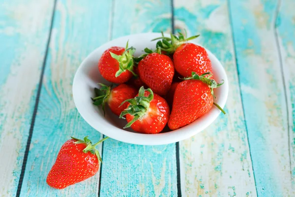 Strawberries in a white bowl — Stock Photo, Image