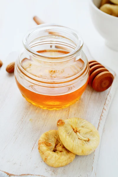 Vaso di miele liquido dorato — Foto Stock
