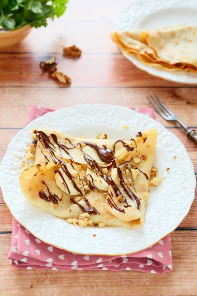 Crepe with banana and chocolate for breakfast — Stock Photo, Image