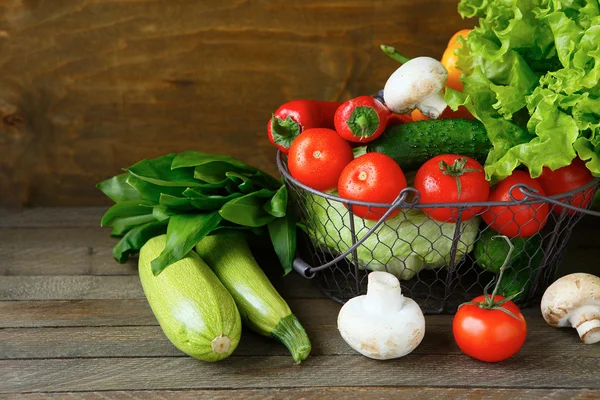 Set of fresh vegetables in a basket — Stock Photo, Image