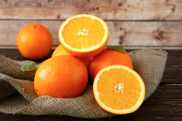 Ripe orange cut in half — Stock Photo, Image