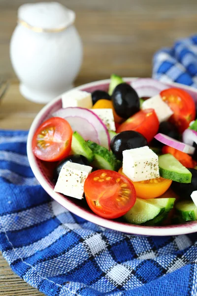 Greek salad with feta cheese in a bowl — Stock Photo, Image