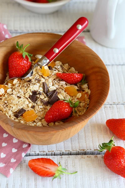 Granola with ripe strawberries in a bowl — Stock Photo, Image