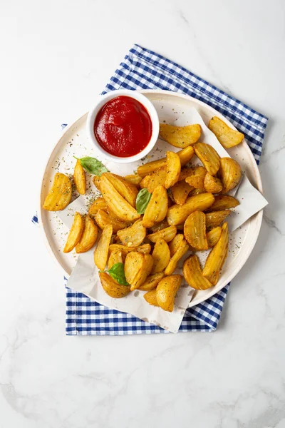 Top View Potatoes Wedges Red Sauce Plate — стоковое фото