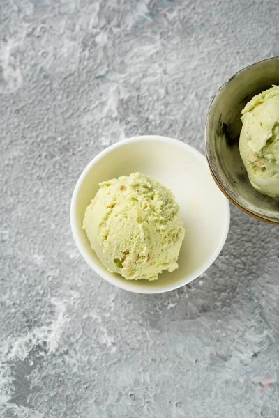 Two Scoops Pistachio Ice Cream Bowls Light Surface — Stockfoto