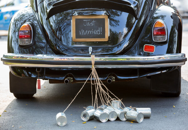 Just married sign and cans attached