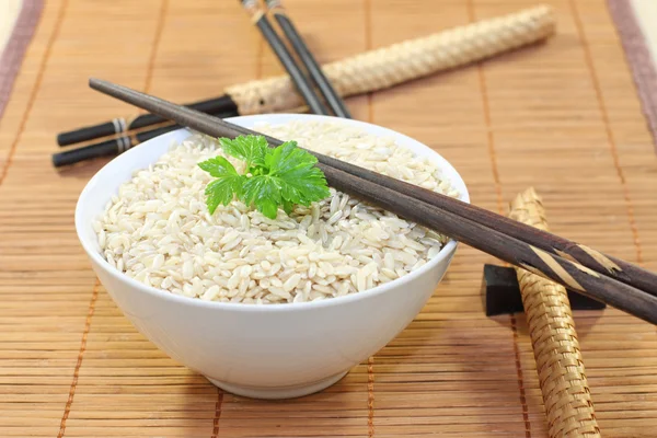 Bowl of rice and chopstick — Stock Photo, Image