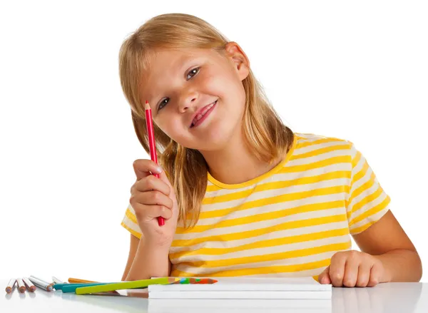 Young girl drawing Royalty Free Stock Photos