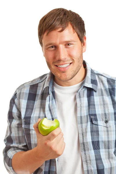リンゴを持った若い男が — ストック写真