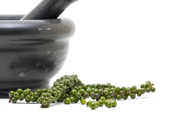 Green peppercorns with mortar — Stock Photo, Image