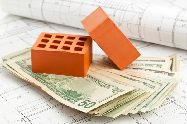 Bricks on construction plan — Stock Photo, Image
