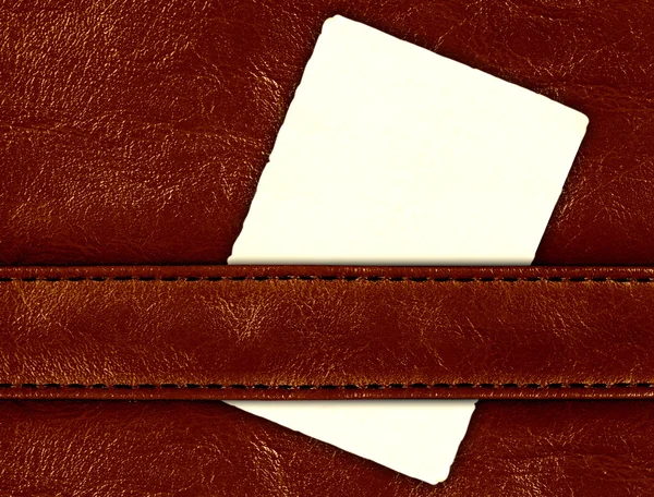 Leather with vintage label — Stock Photo, Image