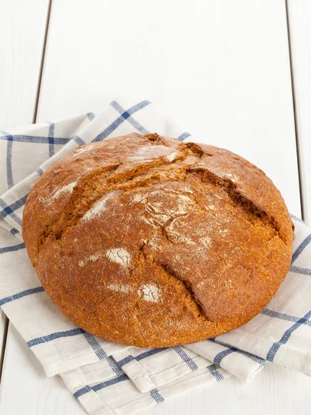 Loaf of bread on table — Stock Photo, Image